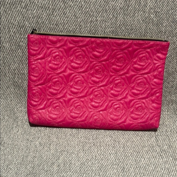 Betsey Johnson Handbags - Betsey Johnson Pink Floral Embossed Laptop Bag